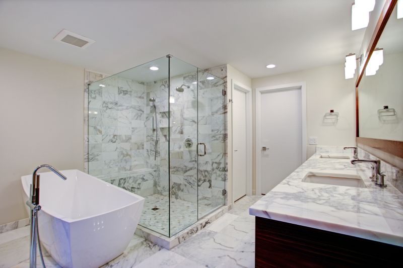 Walk-in shower with marble accents